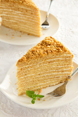 Slice of layered honey cake.