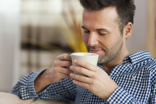 Handsome Man Tasting Morning Coffee