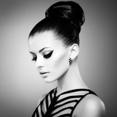 Portrait of beautiful sensual woman with elegant hairstyle.  Per