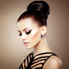 Portrait of beautiful sensual woman with elegant hairstyle.  Per