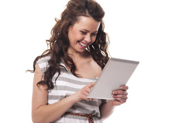 Happy woman using digital tablet