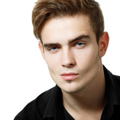 Obraz premium Portrait of handsome young man, sexy guy looking at camera over