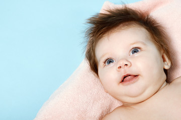 cute infant smiling, beautiful kid's face closeup