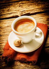 Cup of hot frothy espresso coffee