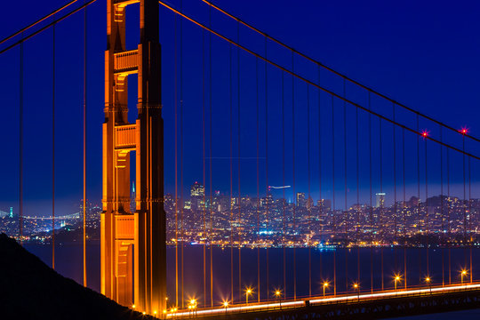 Golden Gate Bridge San Francisco sunset through cables
