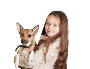 little girl with long hair holding a dog