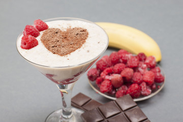 Cocktail of banana, raspberry and chocolate.