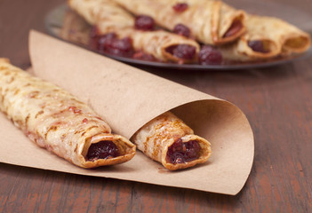 Pancakes with raspberry jam.