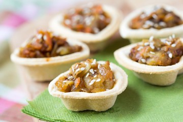 Eggplants canape with onion, carrots, sesame in tartlet