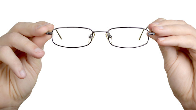 Man's hands holding glasses