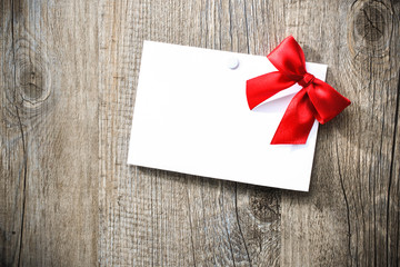 Greeting card with red ribbon