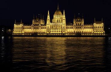 Fototapeta premium Evening view of an illuminated Building of Hungarian Parliament