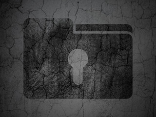 Business concept: Folder With Keyhole on grunge wall background