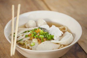 Pork meatballs and steam fish in noodle soup