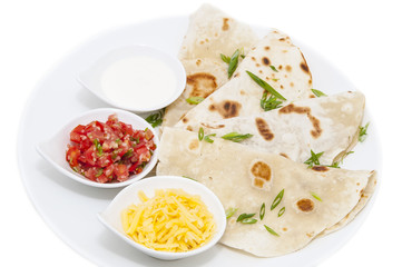 Mexican food dishes at the restaurant on a white background