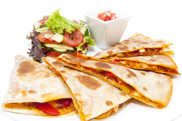 Mexican food dishes at the restaurant on a white background