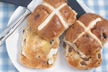 Hot Cross Buns toasted and buttered