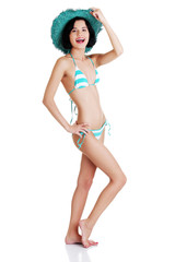 Sexy brunette woman posing in bikini