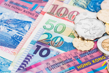 Hong Kong dollar money banknote close-up with coins