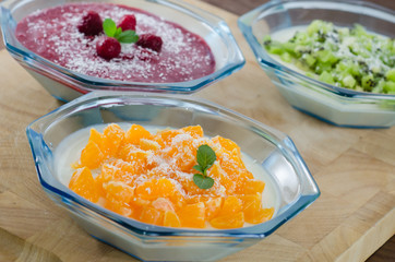 Panna Cotta with mandarins, berries and kiwi