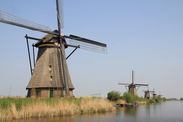 Windmills on the canal bank.