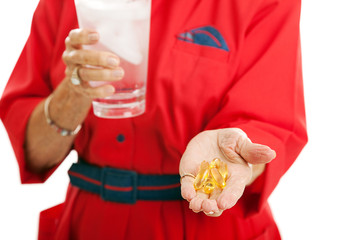 Woman Taking Omega 3 Fish Oil