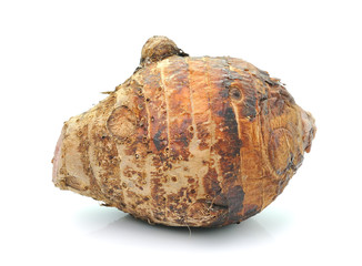 taro roots on white background