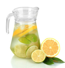 Cold water with lime, lemon and ice in pitcher isolated on