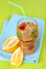 Basil lemonade with strawberry in glass,