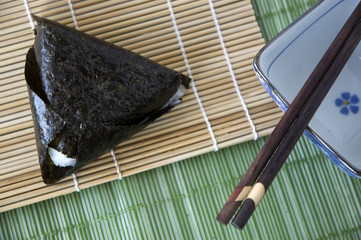 japanese rice ball with chopstick