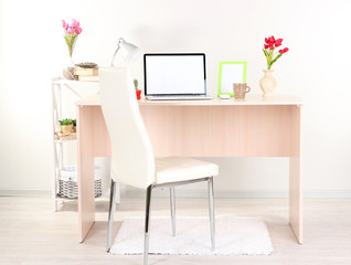 Workplace at home with laptop, close up