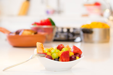 Closeup on fruit salad in kitchen