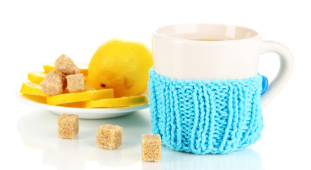 Cup of tea with lemon isolated on white