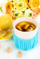 Cup of tea with lemon close up