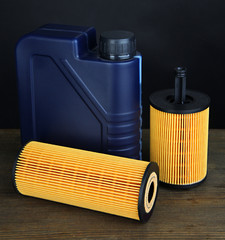 Motor oil canister on grey background