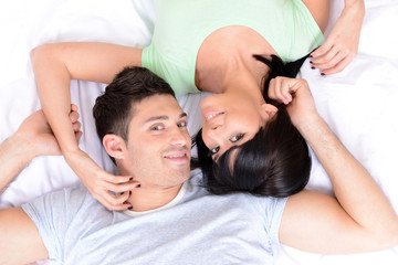 Obraz na płótnie Canvas Couple in love in bed