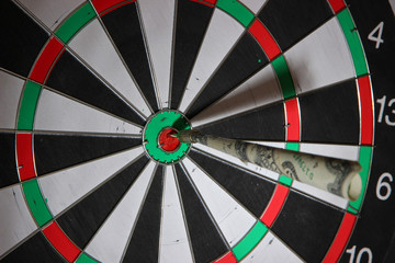 Money dart and target close up. Concept of success.