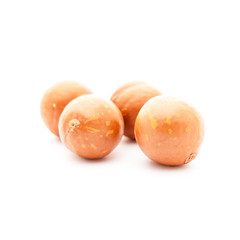 macadamia nuts on white background