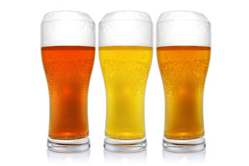 Three glasses with different beers