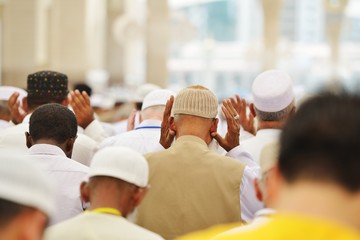 Naklejka premium Muslim people in crowd