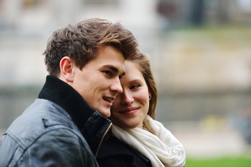 Fototapeta premium Lovely couple enjoying fall in love at park