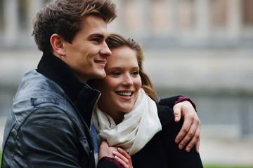 Lovely couple enjoying fall in love at park