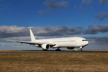 Fototapeta na wymiar White plane after landing at the airport