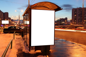 Blank sign at bus stop in city