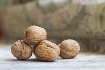 Differents walnuts with green background