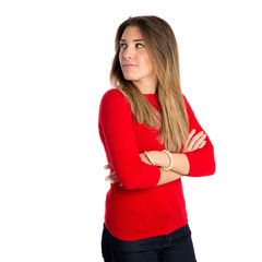 Girl with her arms crossed over isolated background