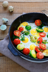 healthy and nutritious breakfast - fried eggs with vegetables