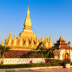 Naklejka premium Grand Golden Stupa with Blue Sky before Sunset, Laos