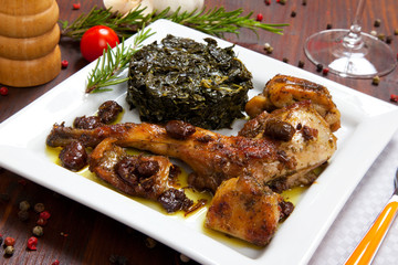 baked rabbit with vegetables in a dish
