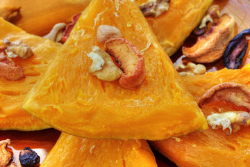 Baked pumpkin with dried fruits and nuts